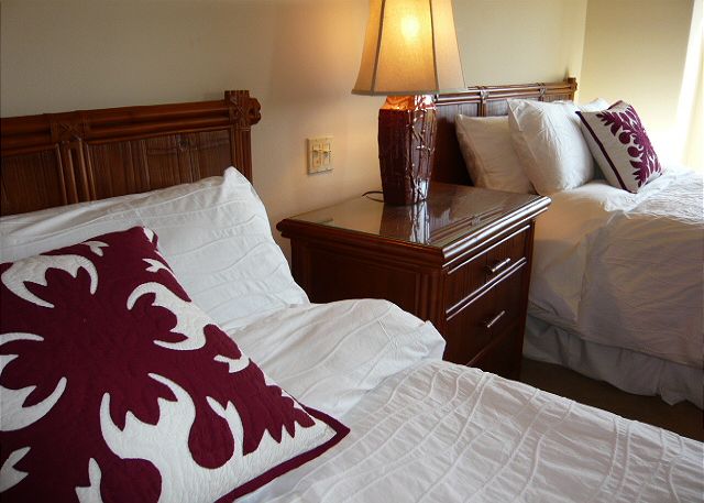 Upstairs bedroom with 2 full beds and adjoining bath.
