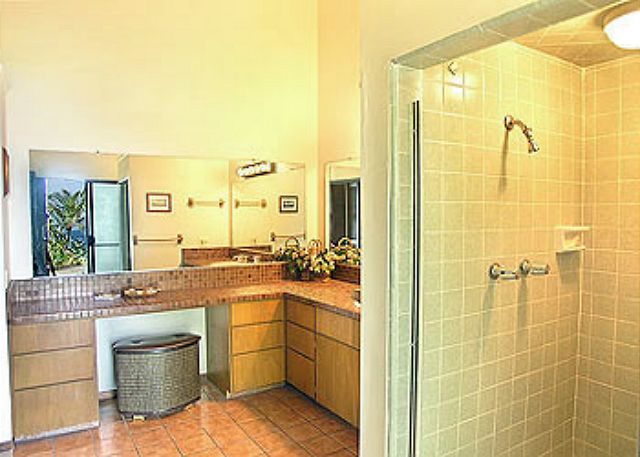 Master bath with access to the back yard and pool.