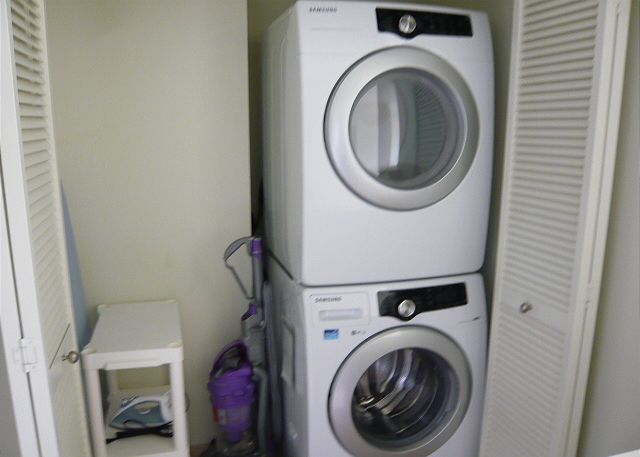 Full sized Samsung front load washer/dryer.