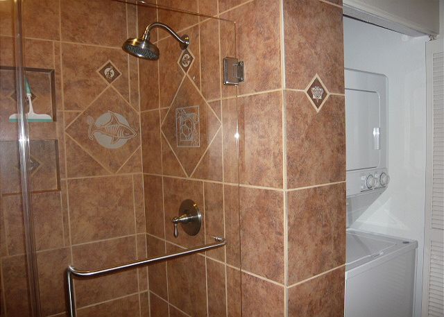 Newly remodeled downstairs bath with full sized washer/dryer.