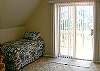 This is a huge bedroom upstairs with a twin and a queen bed.  It also has a huge closet and even room for an air mattress on the floor if need be.