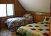 This is another big room with a twin bed, queen bed and sofa sleeper.  It also has a 20 inch HDTV in the room for the kids.