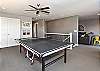 The upstairs recreation room includes a ping pong table and a video gaming console if you are in the mood for some friendly competition.