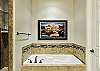 Let your worries soak away while relaxing in the large Main Bathtub and spacious walk-in shower. 