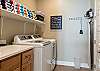 Laundry room equipped with detergent, pool towels, iron/ironing board.  No need to overpack, just do a load of laundry while visiting.
