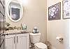 For your guests convenience this half bath is located downstairs. 