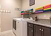 The laundry room has a washer, dryer, iron, ironing board and is stocked with laundry detergent if you desire to wash your clothes during your stay.
