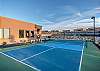 This private pickleball court is located on the side of the house and has outdoor lights for late night fun!