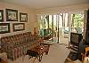 Living room with deck and lake view