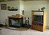 Living room fireplace and TV