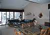 Dining room and living room with lake view