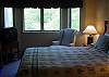 Master bedroom with queen bed and private bath