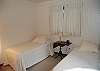 2nd bedroom with two twin beds