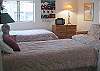 2nd bedroom with two twin beds and a queen futon on main level
