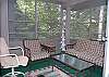 Screened porch off of the living room on the main level