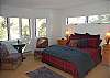 Master bedroom with queen bed and private bath on the main floor