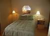 2nd bedroom with queen bed on the lower level
