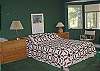 Master bedroom with queen bed and private bath on main level