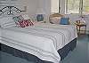 Master bedroom with queen bed and private bath