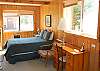 Master bedroom with queen bed and private half bath