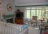 Living room with air conditioning,  fireplace and sofa bed