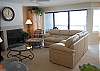 Living room with fireplace and lake view