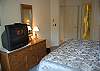 Master bedroom with king bed and private bath