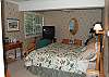 4th bedroom with king bed on the main floor