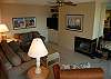 Living room with fireplace and flat screen TV