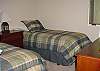 4th bedroom with two twin beds on the lower level