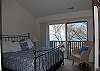 Master bedroom with king bed, private bath and lake view