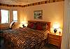 Master bedroom with king bed and private bath