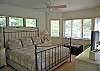 Master bedroom with king bed and a private bath on the main level
