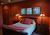 Master bedroom with queen bed and private bath on the main floor
