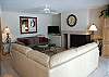 Living room with fireplace and flat screen TV