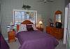 3rd bedroom with queen bed and one set of twin bunk beds on the second floor