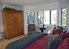 Master bedroom with queen bed and private bath on the main floor