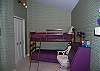 3rd bedroom with queen bed and one set of twin bunk beds on the second floor