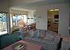 Living room, kitchen and dining room, all with lake view