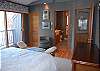 Master bedroom with queen bed, private bath and private deck on the main floor