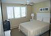 3rd bedroom with queen bed and lake view on the second floor
