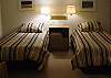 3rd bedroom with two twin beds on the lower level