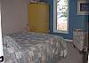 2nd bedroom with queen bed and lake view on the second floor