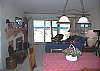 Dining room and living room with lake view