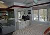master bedroom with air conditioning and Jacuzzi tub