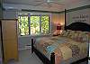 Master bedroom with king bed and air conditioning