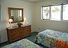 3rd bedroom with two twin beds and lake view on the second floor