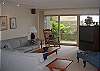 Family room with walk-out patio and deck on the lower level