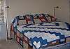 Master bedroom with king bed and private bath