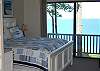 Master bedroom with king bed, private bath and lake view